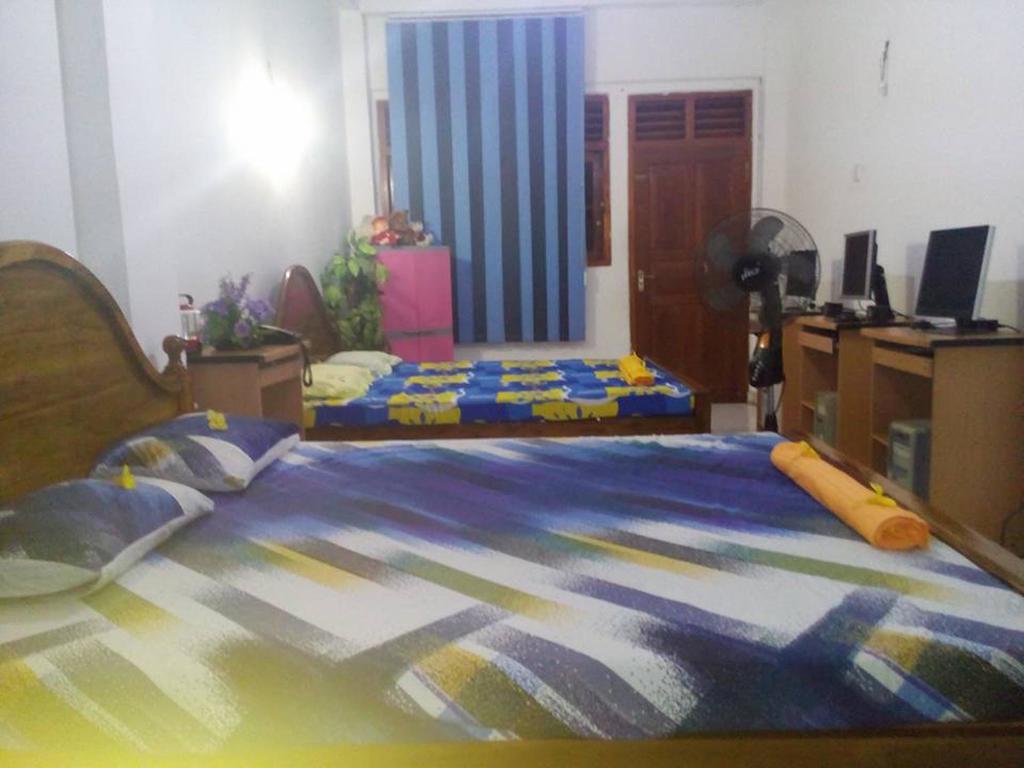 Smart Holiday Inn Galle Habitación foto